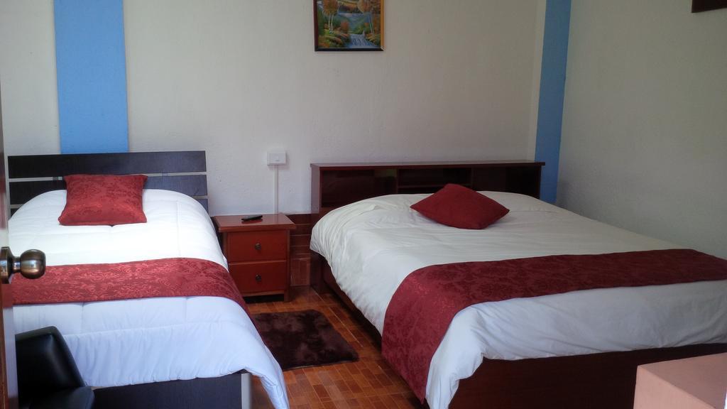 Hostal El Parque Tababela Bilik gambar