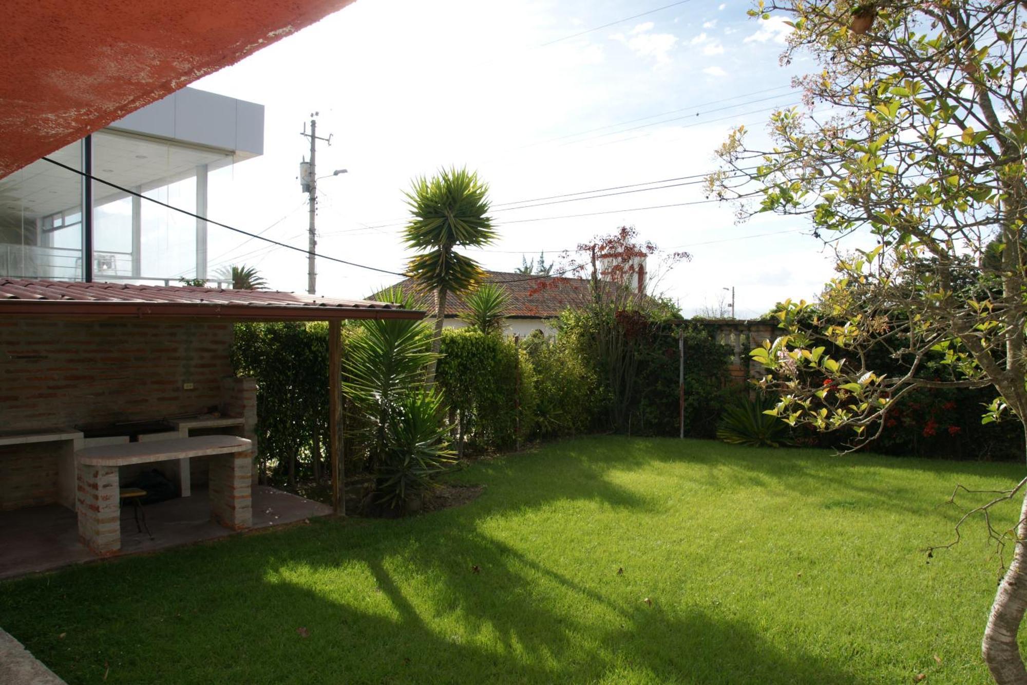 Hostal El Parque Tababela Bilik gambar